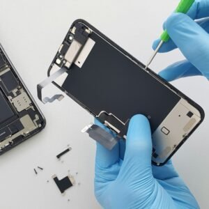 Technician holding a smartphone